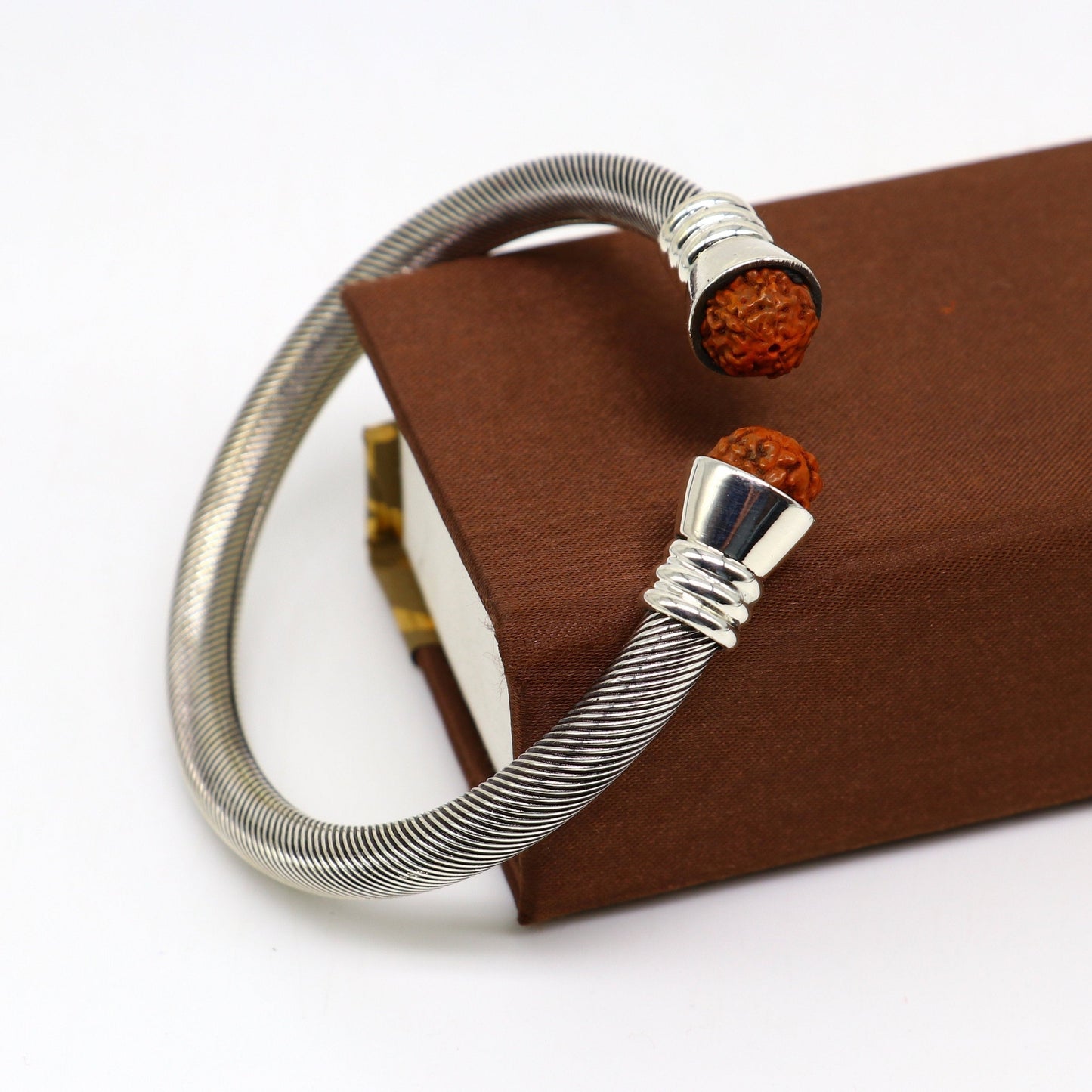Sterling silver Rudraksha beads customized bangle cuff bracelet from Tribal Ornaments, adjustable unisex jewelry with vintage style.