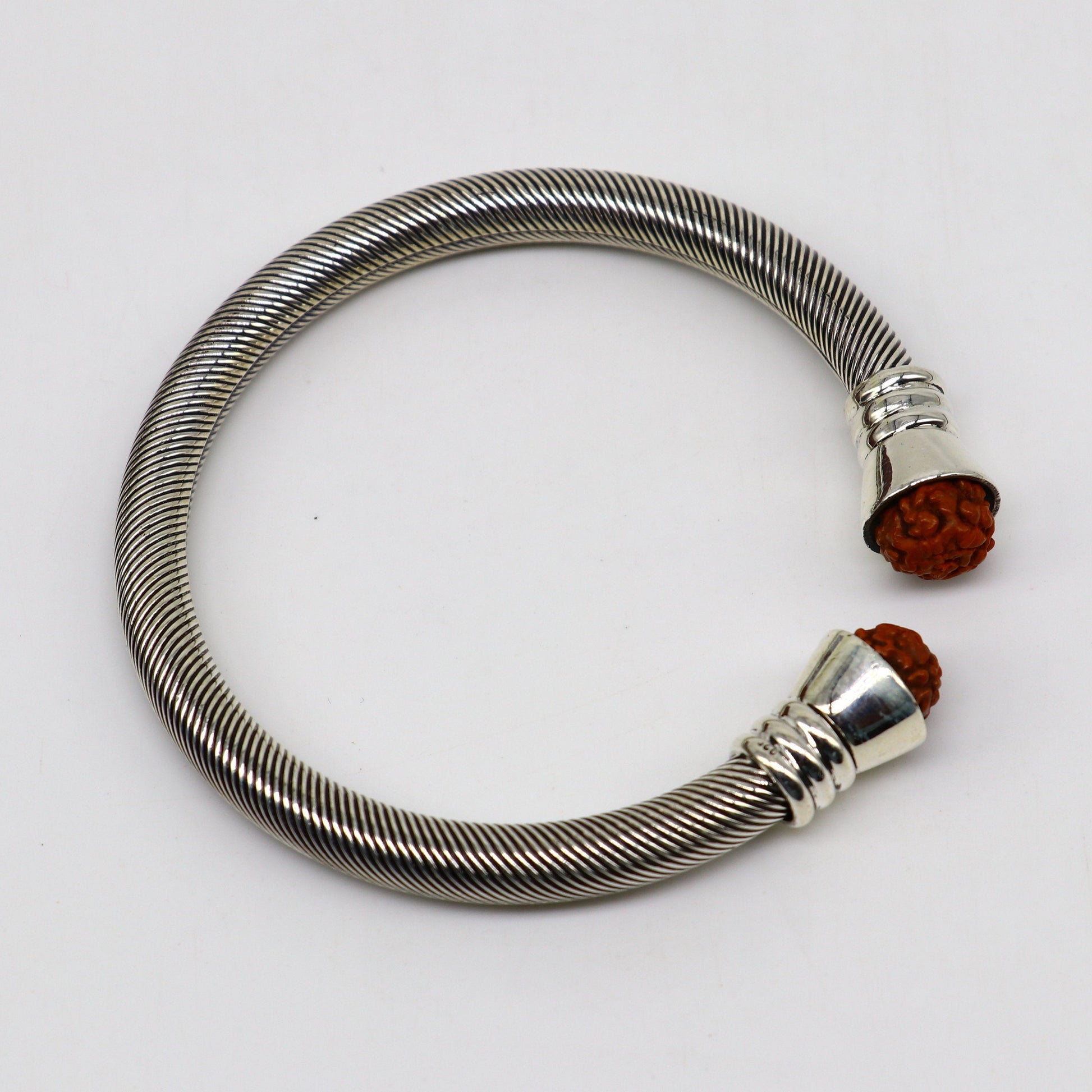 Sterling silver Rudraksha beads customized bangle cuff bracelet from TRIBAL ORNAMENTS, adjustable unisex jewelry with vintage style.