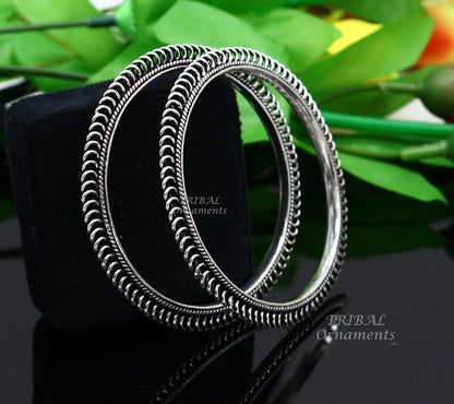 Sterling silver handmade vintage tribal bangle bracelet with intricate design, ideal for brides and belly dance jewelry by TRIBAL ORNAMENTS.