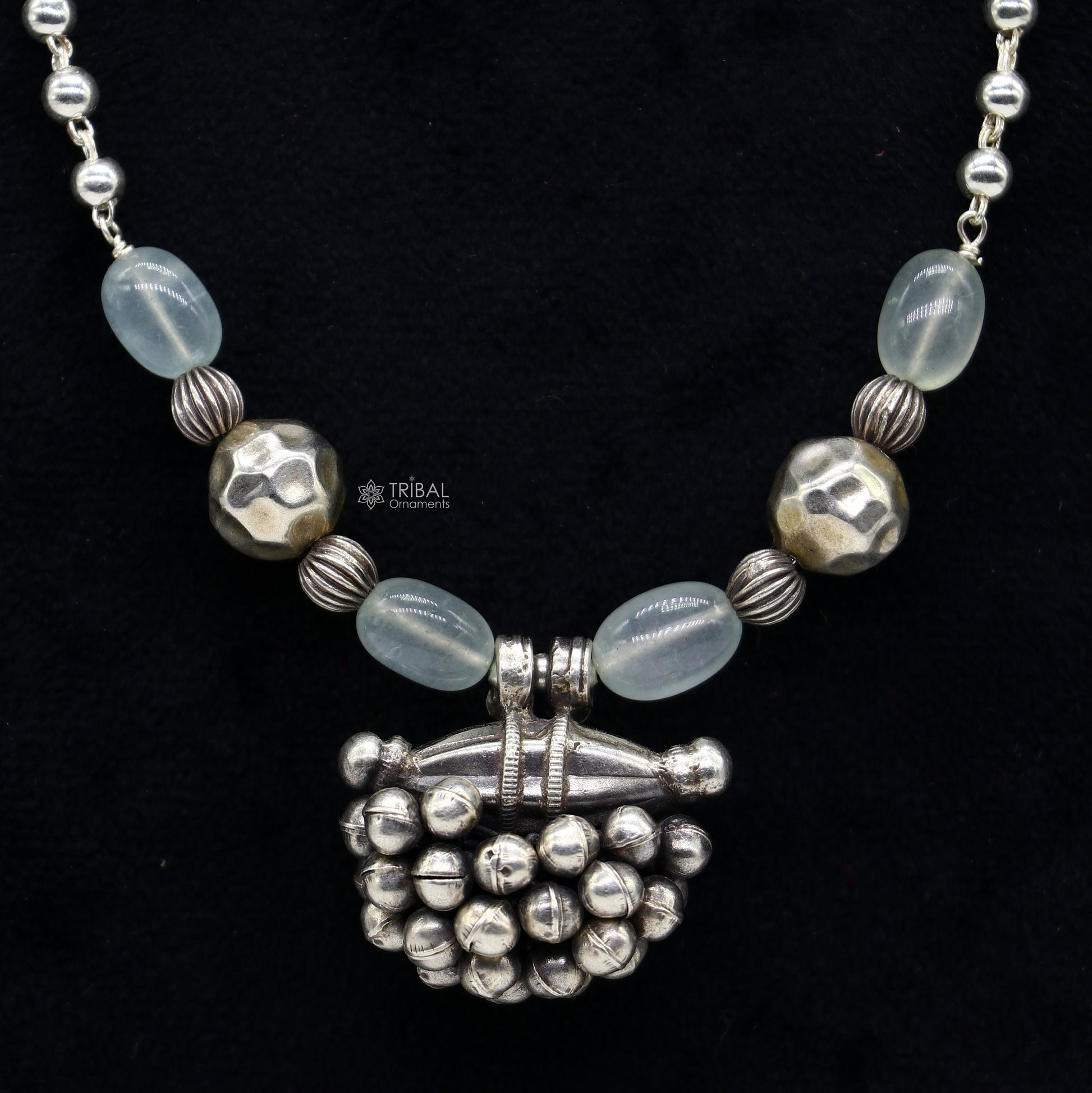 Sterling silver vintage tribal pendant with beaded 24-inch necklace, featuring ethnic design and handcrafted craftsmanship.