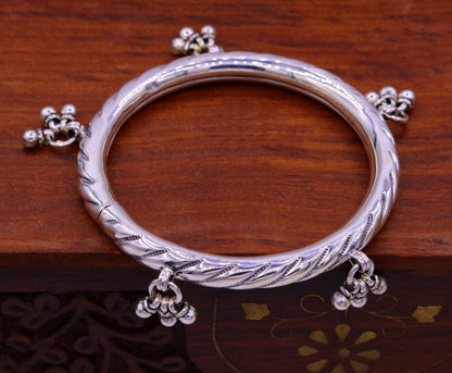Vintage design 925 sterling silver charm bangle from Tribal Ornaments, featuring handcrafted tribal wedding jewelry for brides and bridesmaids.