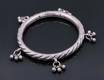Sterling silver vintage design charm bangle bracelet featuring tribal-inspired details, handmade by TRIBAL ORNAMENTS for wedding jewelry.