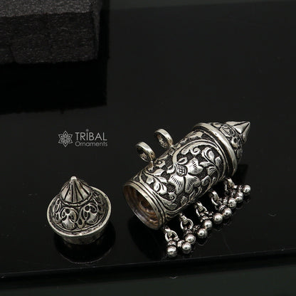 Sterling silver vintage tribal pendant with intricate design and hanging drops, crafted by Tribal Ornaments.