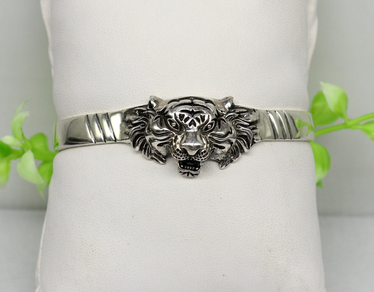 Sterling silver handmade vintage lion design bangle cuff bracelet by Tribal Ornaments, adjustable tribal-style jewelry for daily wear.