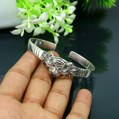 Sterling silver handmade vintage lion design bangle cuff bracelet by Tribal Ornaments, adjustable tribal style jewelry for daily wear.