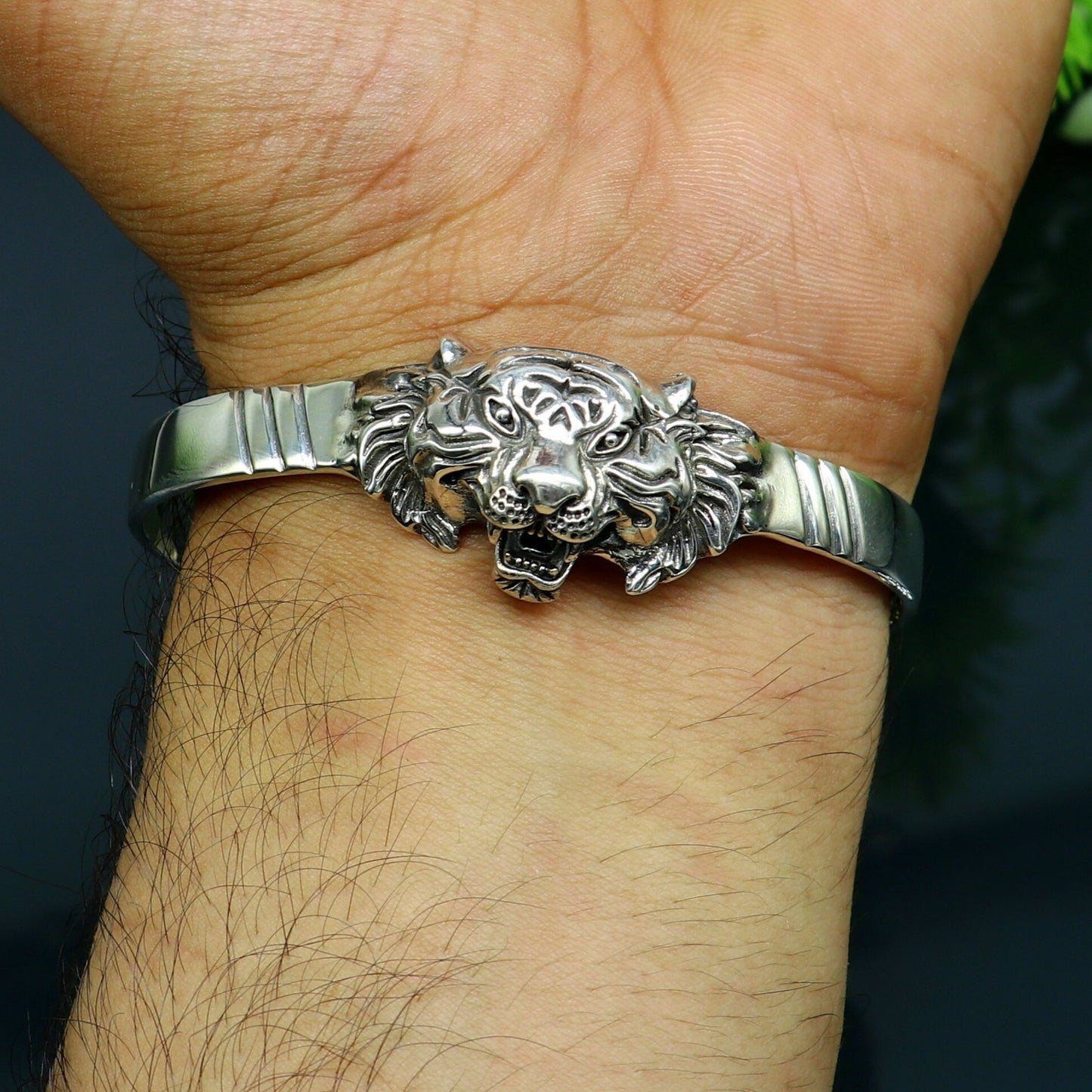 Sterling silver handmade vintage lion design bangle cuff bracelet by TRIBAL ORNAMENTS, adjustable tribal-style jewelry for daily wear.