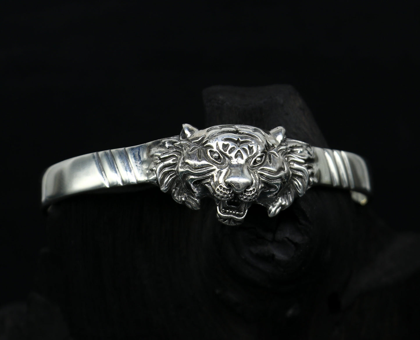 Sterling silver handmade vintage lion design bangle cuff bracelet by TRIBAL ORNAMENTS, adjustable tribal-style jewelry for daily wear.