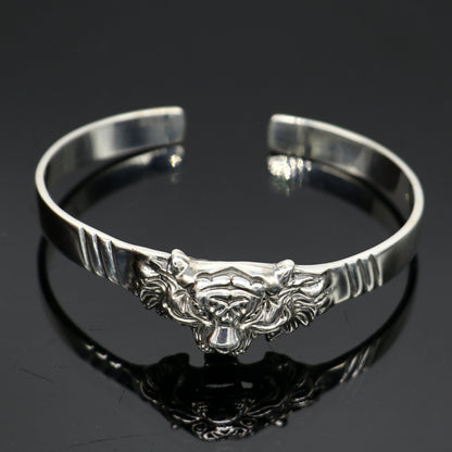Sterling silver handmade vintage lion design bangle cuff bracelet by Tribal Ornaments, adjustable tribal-style jewelry for daily wear.