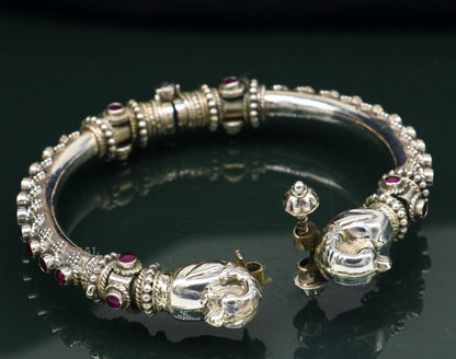 Sterling silver tribal belly dance bangle bracelet with vintage peacock design and cubic zircon stones, handcrafted tribal ornament jewelry.