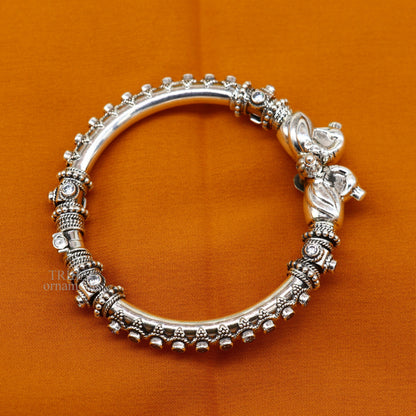 Sterling silver tribal belly dance bangle bracelet with vintage peacock design and cubic zircon stones, handcrafted ethnic jewelry.