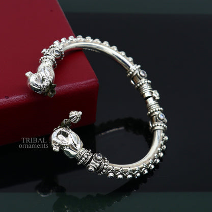 Sterling silver tribal belly dance bangle bracelet with vintage peacock design and cubic zirconia stones, handcrafted ethnic jewelry.