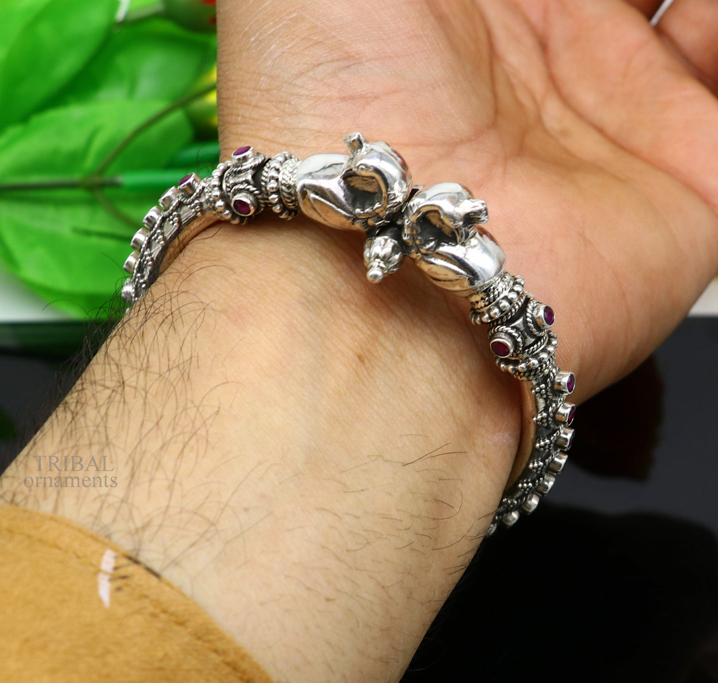 Vintage 925 sterling silver tribal belly dance bangle with peacock design and garnet stones, handmade ethnic jewelry by TRIBAL ORNAMENTS.