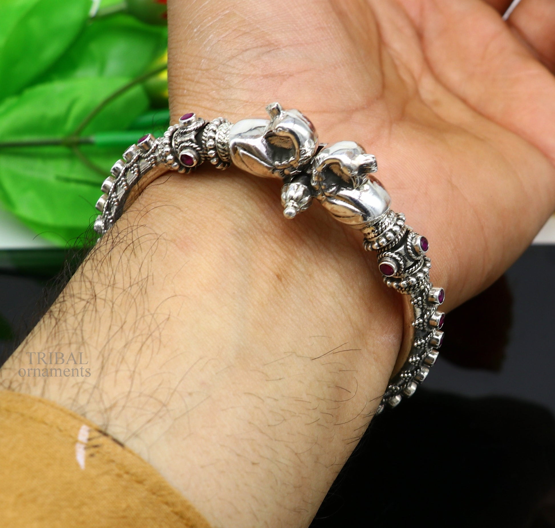 Vintage 925 sterling silver tribal belly dance bangle with peacock design and garnet stones, handmade ethnic jewelry by TRIBAL ORNAMENTS.