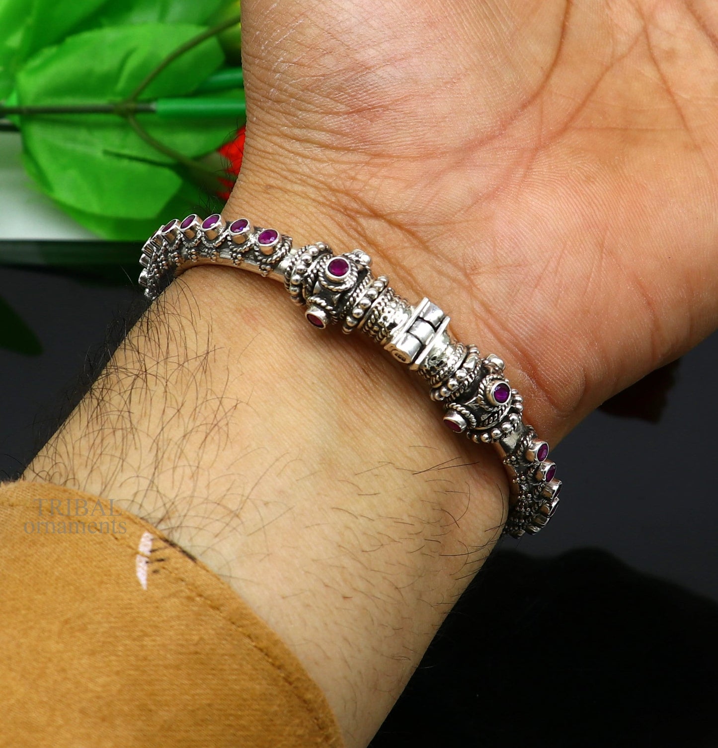 Sterling silver vintage peacock tribal belly dance bangle bracelet with garnet stones, intricate design, handmade by Tribal Ornaments.