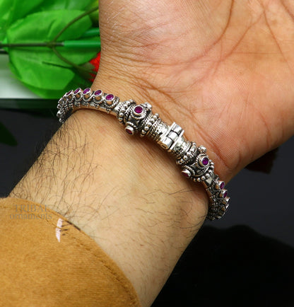 Sterling silver vintage peacock tribal belly dance bangle bracelet with garnet stones, intricate design, handmade by Tribal Ornaments.