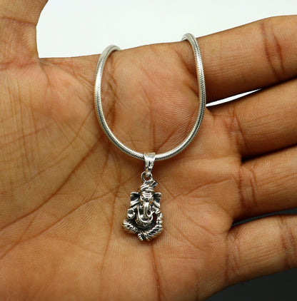 Sterling silver Ganesha pendant by TRIBAL ORNAMENTS, unisex jewelry featuring a handmade vintage-style idol design.