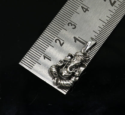 925 sterling silver Ganesha pendant by TRIBAL ORNAMENTS, handcrafted unisex jewelry with intricate detail and vintage style.