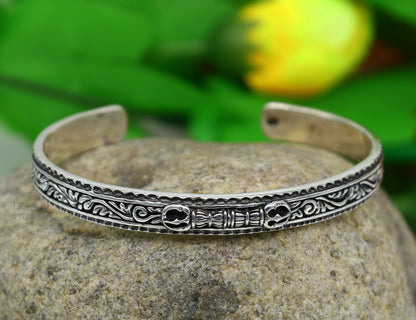 Sterling silver vintage Vajra design unisex bangle cuff bracelet with intricate tribal motifs, handmade tribal jewelry by TRIBAL ORNAMENTS.