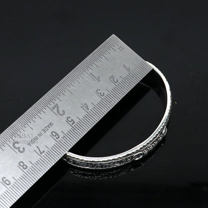 Sterling silver vintage Vajra design unisex tribal bangle cuff bracelet with intricate handmade craftsmanship.