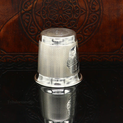 Handmade 925 sterling silver baby glass tumbler by TRIBAL ORNAMENTS, featuring intricate silver utensils and baby food dining set.