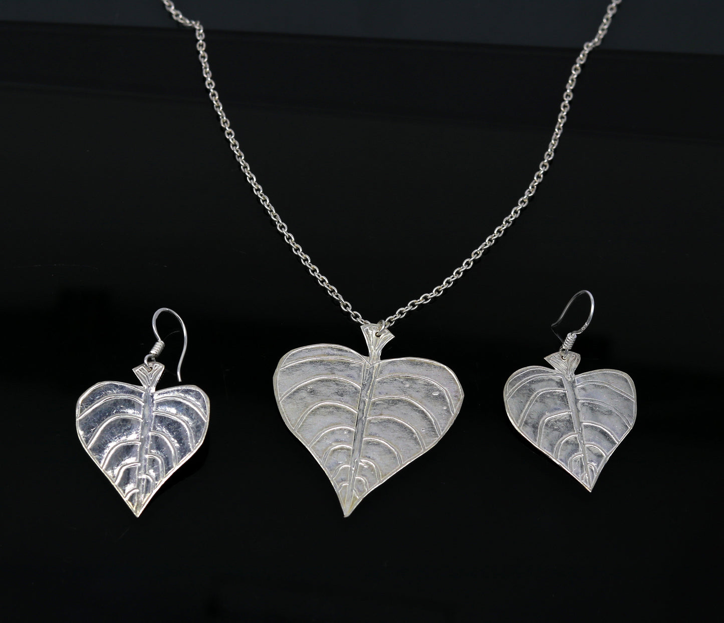 925 sterling silver heart-shaped peepal tree leaves pendant necklace and matching hoops earrings, tribal bride jewelry set.