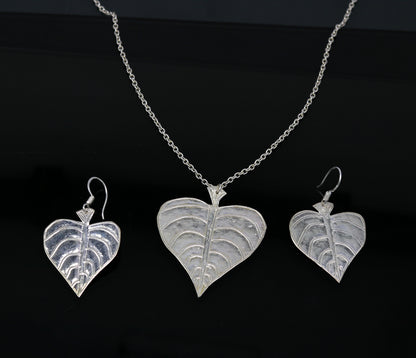 925 sterling silver heart-shaped peepal tree leaves pendant necklace and matching hoops earrings, tribal bride jewelry set.