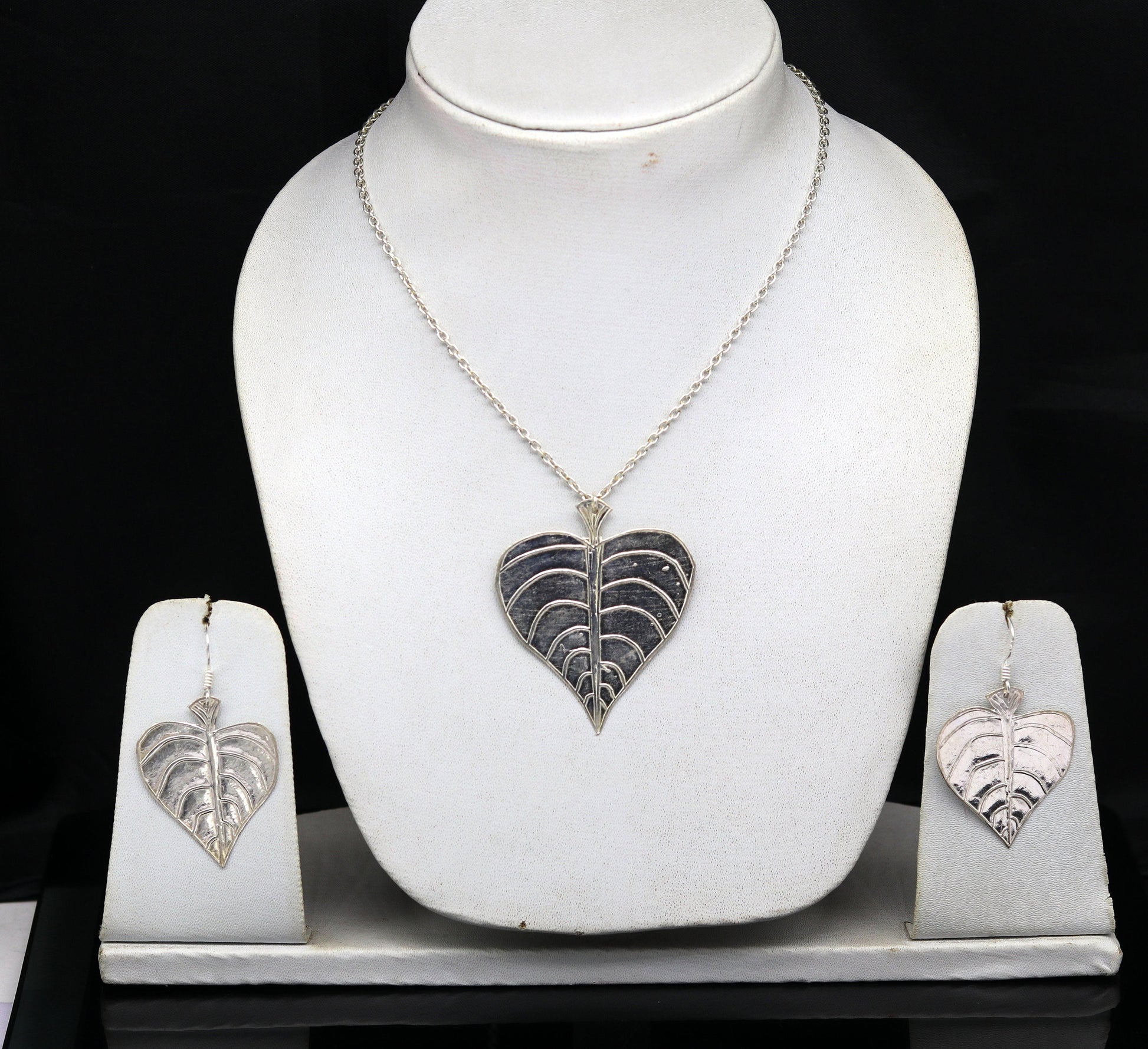 Sterling silver heart-shaped peepal tree leaves pendant necklace with matching hoops earrings, handcrafted tribal jewelry for brides.