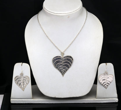 Sterling silver heart-shaped peepal tree leaves pendant necklace with matching hoops earrings, handcrafted tribal jewelry for brides.