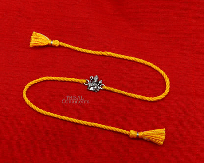 925 Sterling silver Lord Hanuman bracelet thread rakhi by Tribal Ornaments with intricate Hindu deity design.
