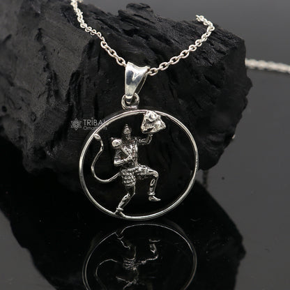 Sterling silver Lord Hanuman pendant by Tribal Ornaments featuring detailed Hindu deity design, unisex vintage jewelry.