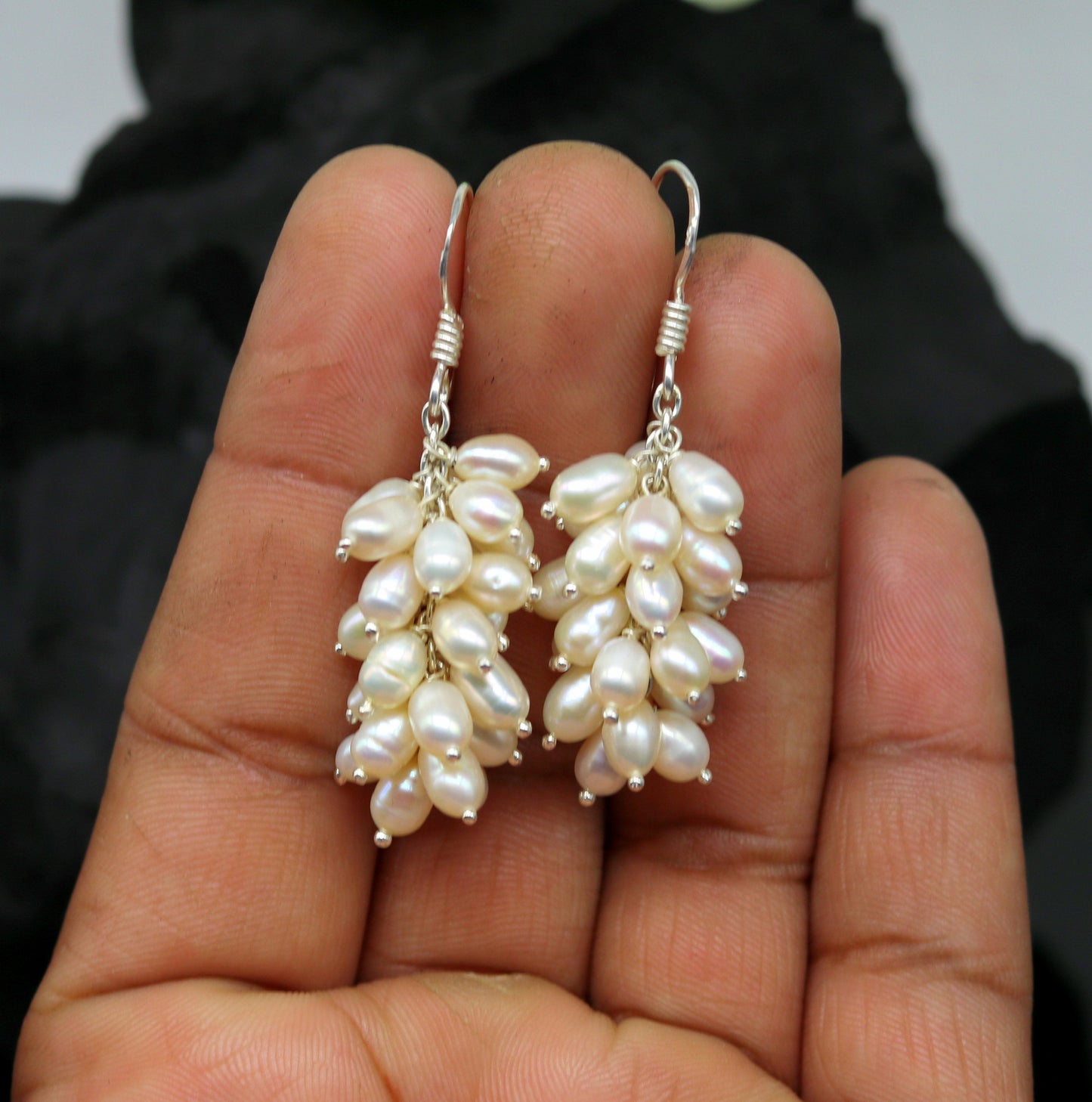 Sterling silver hoops earrings with elegant pearls from TRIBAL ORNAMENTS, showcasing a stylish and sophisticated jewelry design.