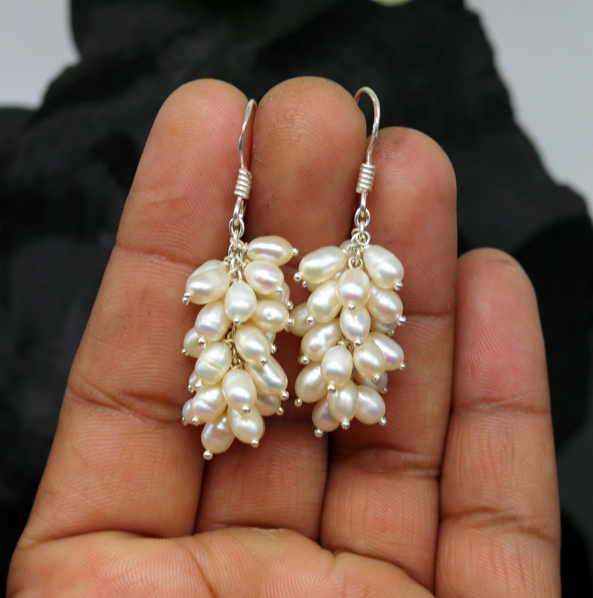 Sterling silver hoops earrings with elegant pearls from TRIBAL ORNAMENTS, showcasing a stylish and sophisticated jewelry design.