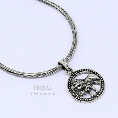 Sterling silver lion pendant by Tribal Ornaments, unisex Leo zodiac pendant with traditional Indian design and cultural craftsmanship.