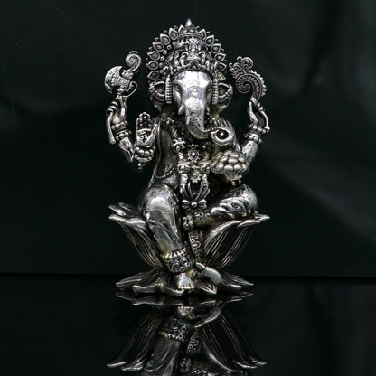 Handcrafted 925 sterling silver Lord Ganesh idol sculpture, ideal for puja rituals and Diwali decorations.