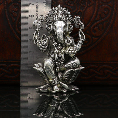 Handcrafted 925 sterling silver Lord Ganesh idol sculpture, traditional figurine for Diwali puja and spiritual offerings.