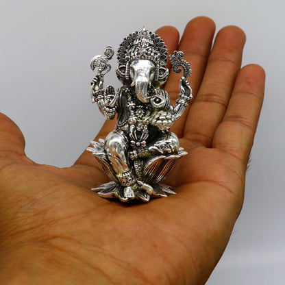 Handcrafted 925 sterling silver Lord Ganesh idol sculpture for pooja, featuring intricate details, ideal for Diwali puja offerings.