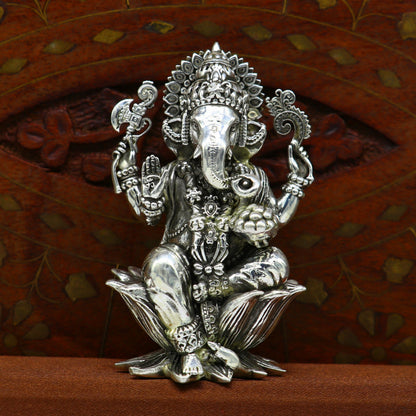 Handcrafted 925 sterling silver Lord Ganesh idol, detailed sculpture for Diwali puja and spiritual offerings.