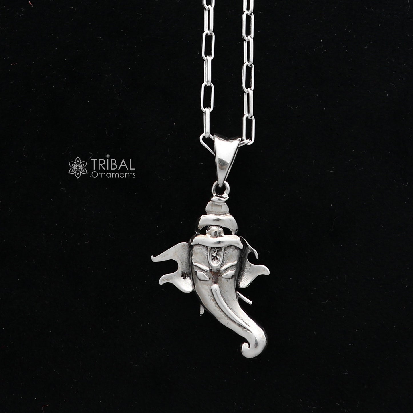 Sterling silver Lord Ganesha pendant with unique design, unisex handmade jewelry by Tribal Ornaments.
