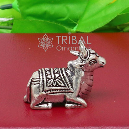 Small 925 silver Lord Shiva Nandi Maharaj figurine by TRIBAL ORNAMENTS, handmade divine statue for puja and spiritual gifting.