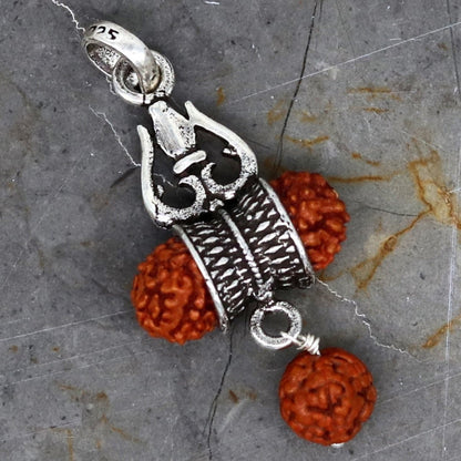 Sterling silver Lord Shiva trident pendant with Rudraksha and oxidized tribal design, suitable for belly dance jewelry.