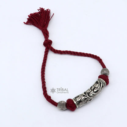 Stylish 925 sterling silver tribal charm bracelet with adjustable design, perfect for wedding and ethnic jewelry gifting.