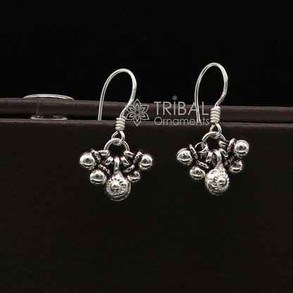 Sterling silver trendy hoop earrings with noisy bell accents, hanging drops, tribal jewelry style from Tribal Ornaments.