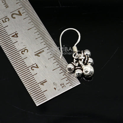 Sterling silver tribal hoop earrings with hanging bells and dangle drops, modern trendy tribal jewelry by Tribal Ornaments.