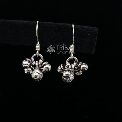 Sterling silver trendy hoops earrings with noisy bells and dangling drops, tribal-inspired jewelry by TRIBAL ORNAMENTS.