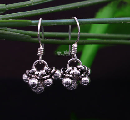 Sterling silver trendy tribal hoops earrings with noisy bells, hanging drop design, perfect for boho and tribal jewelry styles.