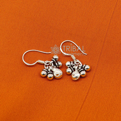 Sterling silver trendy hoop earrings with noisy bells and hanging drops, tribal jewelry style, designed by TRIBAL ORNAMENTS.