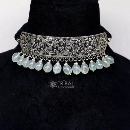925 sterling silver Nakshi work charm necklace choker with tribal ethnic design, showcasing intricate craftsmanship and traditional Rajasthan style.