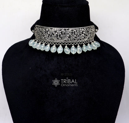 Sterling silver Nakshi work charm necklace and choker set featuring tribal ethnic design and intricate craftsmanship from TRIBAL ORNAMENTS.