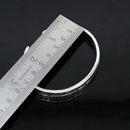 Sterling silver Navkar Mantra cuff bracelet by TRIBAL ORNAMENTS, featuring tribal design, unisex spiritual Jain jewelry.