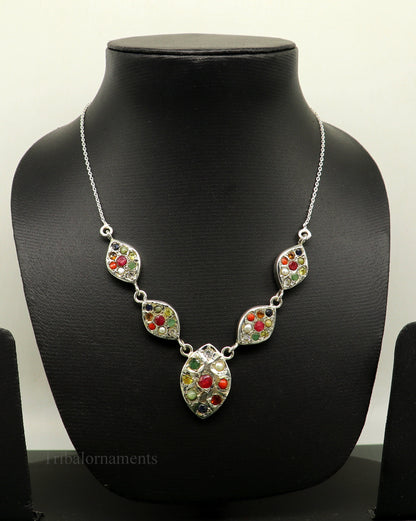 Sterling silver Navratan stone necklace with tribal handcrafted design, ethnic jewelry perfect for belly dance or gift-giving.